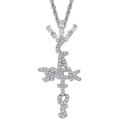 A pave-set pendant shaped like a stacked cross on a fine chain, photographed against white.